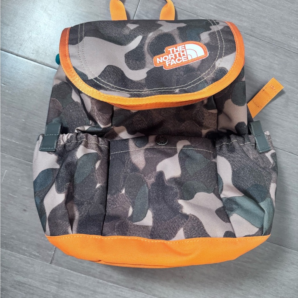 The North Face Camo mini Backpack with Orange Accents